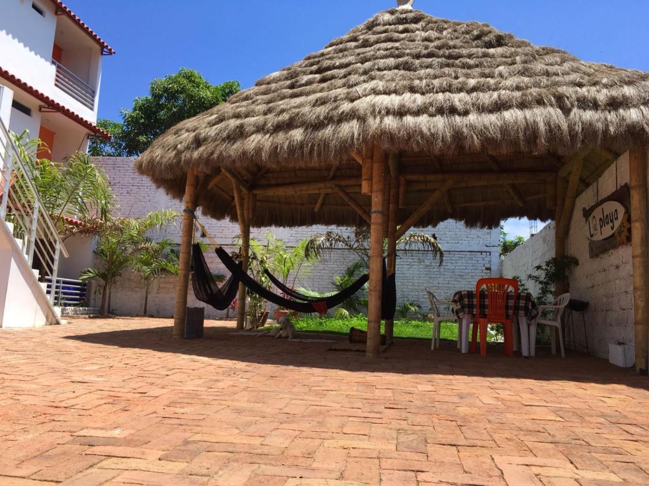 Hostal Quentin Puerto López Exterior foto