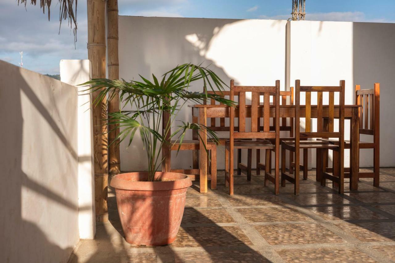 Hostal Quentin Puerto López Exterior foto